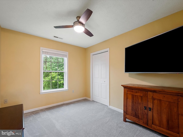 311 Clydesdale Dr, Stephens City, VA 22655 - unfurnished bedroom featuring light carpet, baseboards, and a ceiling fan
