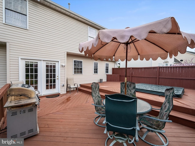 311 Clydesdale Dr, Stephens City, VA 22655 - wooden deck with outdoor dining space, fence, grilling area, and french doors