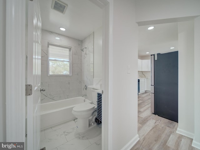 full bathroom with toilet, shower / bathtub combination, visible vents, and recessed lighting