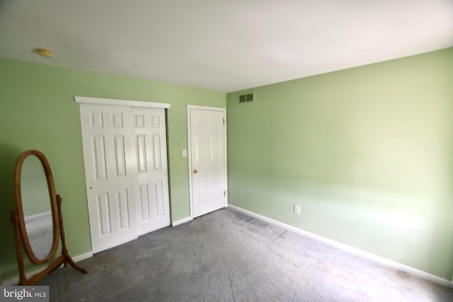 8 Aster Dr, Sicklerville, NJ 08081 - unfurnished bedroom featuring visible vents, baseboards, a closet, and dark colored carpet
