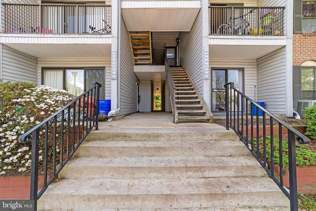 21 Fisher Dr, Franklin Park, NJ 08823 - entrance to property featuring a balcony and central air condition unit