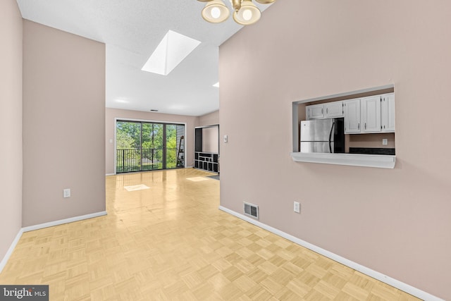 21 Fisher Dr, Franklin Park, NJ 08823 - empty room with a skylight and baseboards