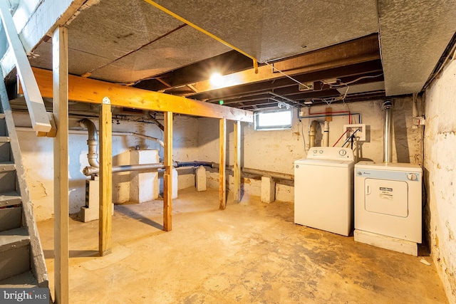 below grade area featuring washer and dryer