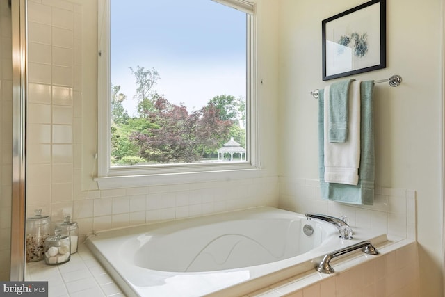 bathroom featuring a garden tub