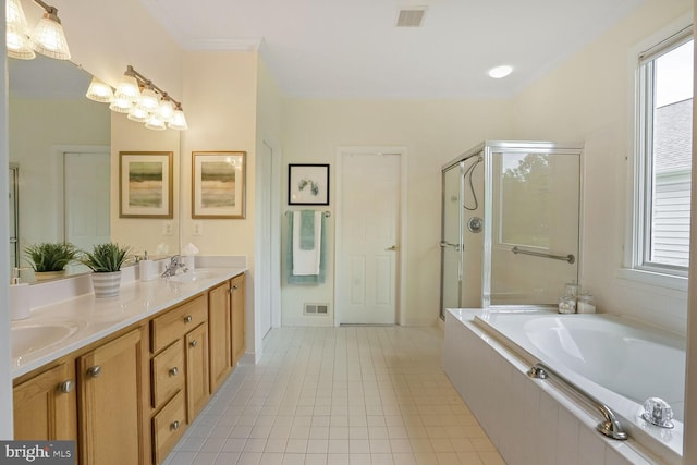 full bath with plenty of natural light, a garden tub, a shower stall, double vanity, and ornamental molding