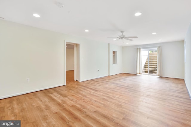 empty room with ceiling fan, light wood-type flooring, recessed lighting, and baseboards