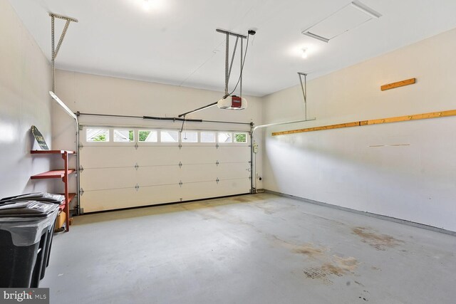 garage featuring a garage door opener