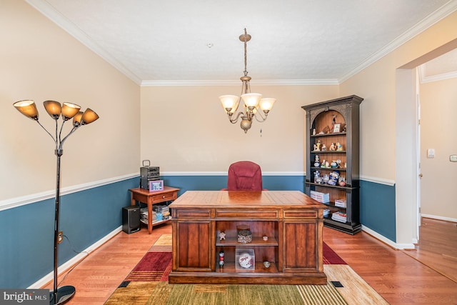 home office with wood finished floors, a chandelier, crown molding, and baseboards