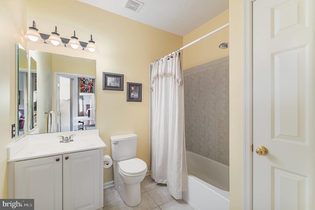 full bath featuring tile patterned flooring, toilet, vanity, shower / bath combo with shower curtain, and baseboards