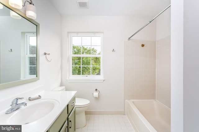 bathroom with visible vents, vanity, toilet, baseboards, and tile patterned floors