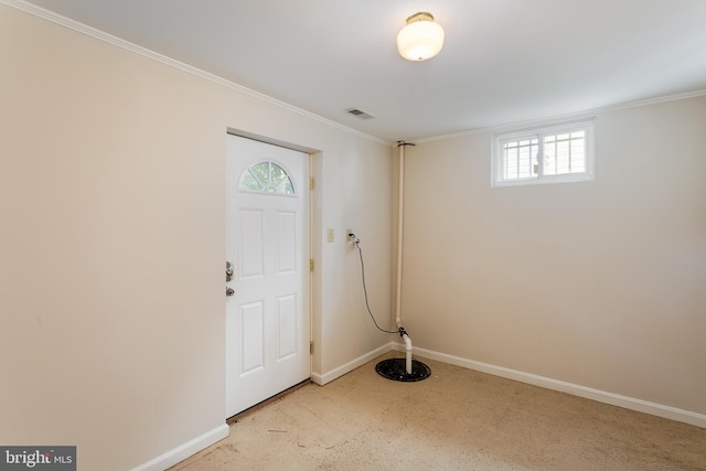 foyer entrance with baseboards, visible vents, and a healthy amount of sunlight
