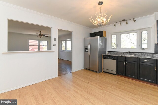 kitchen with a sink, light wood-type flooring, dishwasher, stainless steel fridge, and ornamental molding