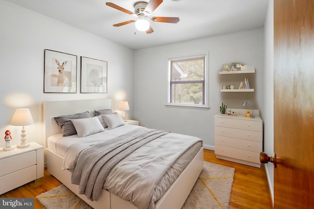 7906 Longmeadow Dr, Frederick, MD 21701 - bedroom with a ceiling fan and light wood finished floors