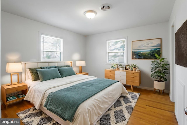 7906 Longmeadow Dr, Frederick, MD 21701 - bedroom featuring light wood finished floors and visible vents