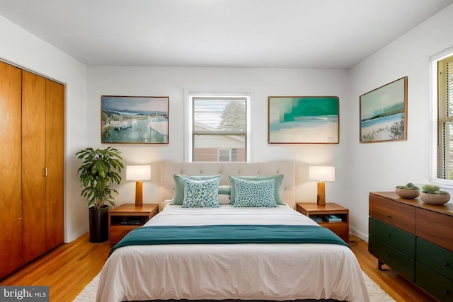 7906 Longmeadow Dr, Frederick, MD 21701 - bedroom featuring wood finished floors and baseboards