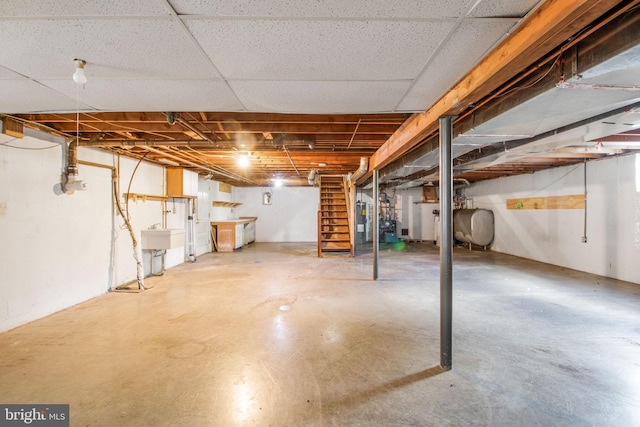 7906 Longmeadow Dr, Frederick, MD 21701 - unfinished basement with heating fuel, a sink, and stairs