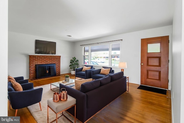 7906 Longmeadow Dr, Frederick, MD 21701 - living area with a wealth of natural light and wood finished floors