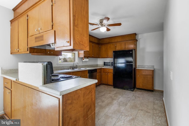 7906 Longmeadow Dr, Frederick, MD 21701 - kitchen featuring a sink, ceiling fan, light countertops, a peninsula, and appliances with stainless steel finishes