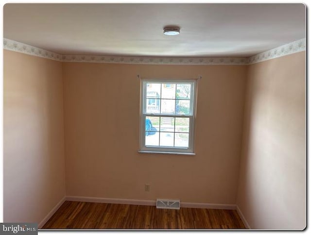 28 Lincoln Pl, Whitehall, PA 18052 - spare room featuring baseboards, wood finished floors, and visible vents