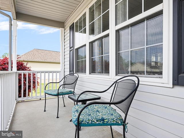 balcony featuring a porch