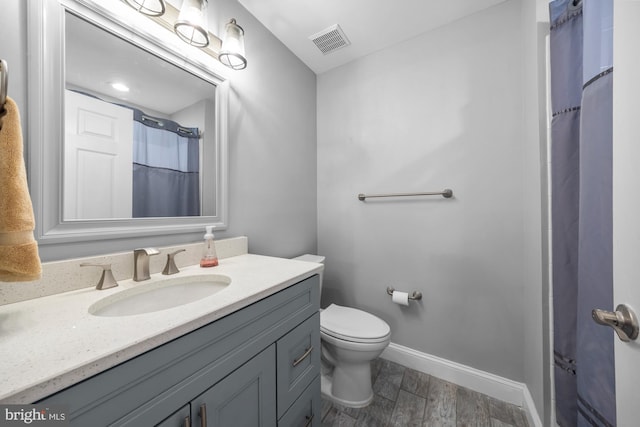1203 Delancey Way, Marlton, NJ 08053 - bathroom featuring wood finished floors, vanity, baseboards, toilet, and visible vents