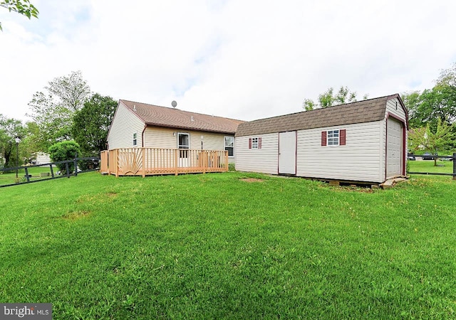 962 Wampler Ln, Westminster, MD 21158 - back of house with an outbuilding, a deck, and roof with shingles