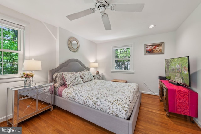4260 25th St N, Arlington, VA 22207 - bedroom featuring wood finished floors, baseboards, a ceiling fan, and multiple windows