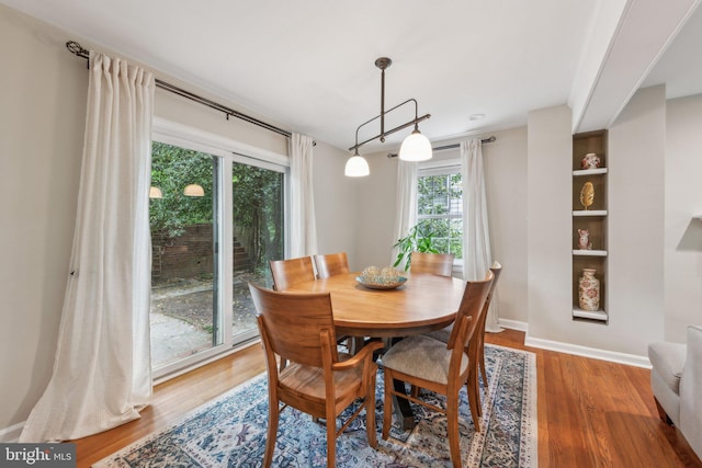 4260 25th St N, Arlington, VA 22207 - dining room with baseboards, plenty of natural light, and wood finished floors