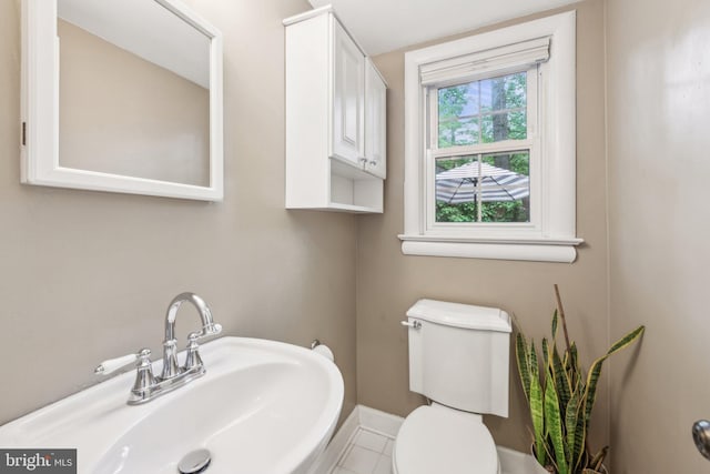 4260 25th St N, Arlington, VA 22207 - bathroom featuring a sink, tile patterned flooring, toilet, and baseboards