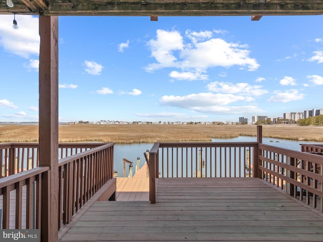674 94th St Unit 154, Ocean City, MD 21842 - wooden terrace featuring a boat dock and a water view