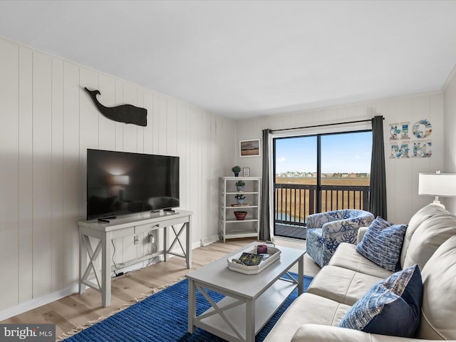 674 94th St Unit 154, Ocean City, MD 21842 - living area featuring baseboards and wood finished floors