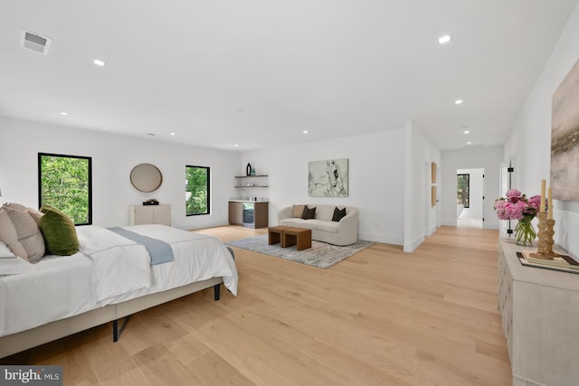 6018 Woodland Ter, Mclean, VA 22101 - bedroom with light wood finished floors, recessed lighting, and baseboards
