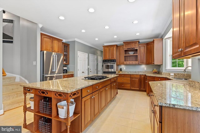 kitchen with crown molding, open shelves, high end refrigerator, a center island, and a sink