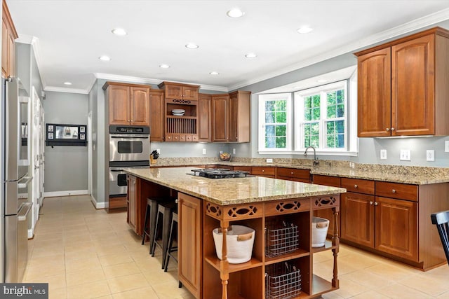 kitchen with a kitchen island, stainless steel appliances, open shelves, and ornamental molding