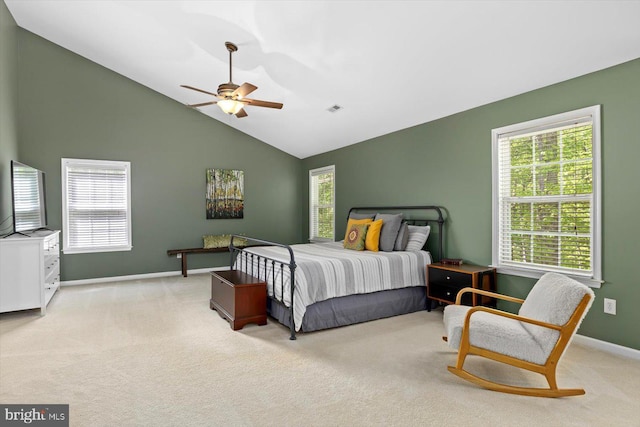 carpeted bedroom featuring visible vents, a ceiling fan, baseboards, and high vaulted ceiling