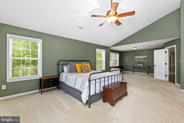 carpeted bedroom with visible vents, baseboards, ceiling fan, and lofted ceiling