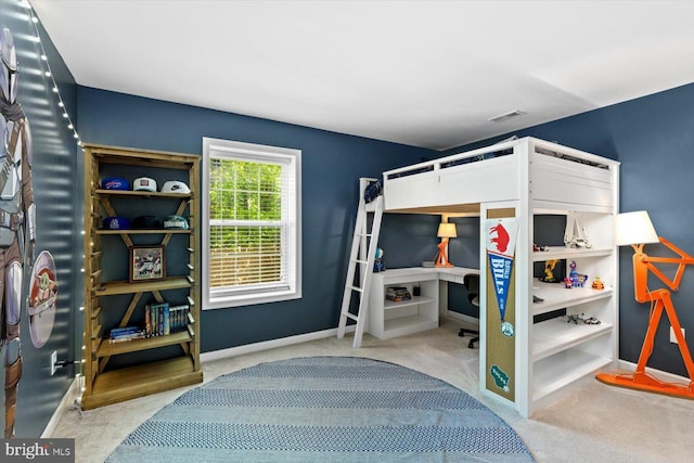 bedroom featuring baseboards, carpet, and visible vents