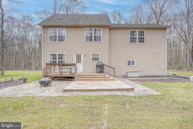519 Squawigm Rd, Dover, DE 19901 - rear view of property featuring a deck, a yard, and a patio