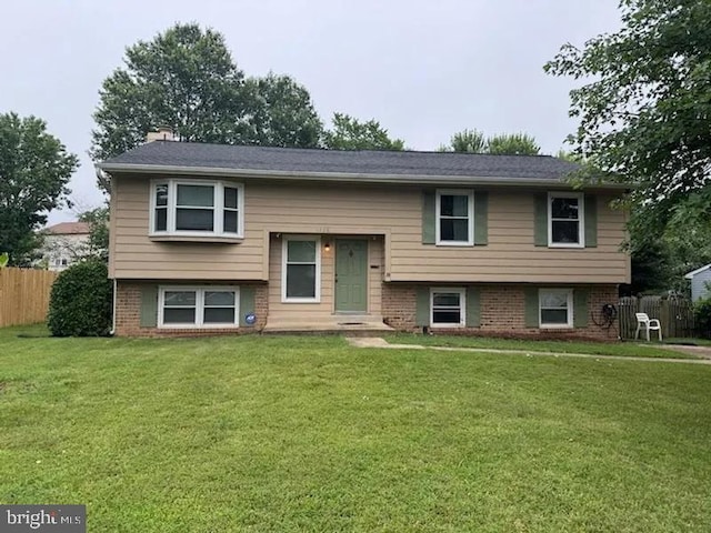 1328 April Way, Herndon, VA 20170 - raised ranch featuring brick siding and a chimney