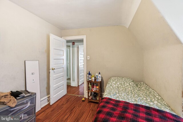 bedroom with wood finished floors