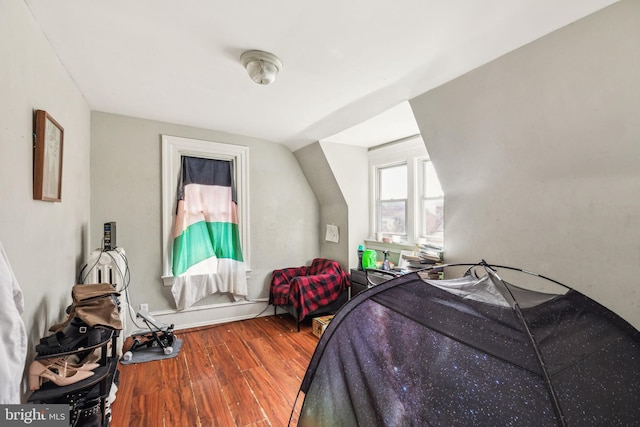bedroom with wood finished floors