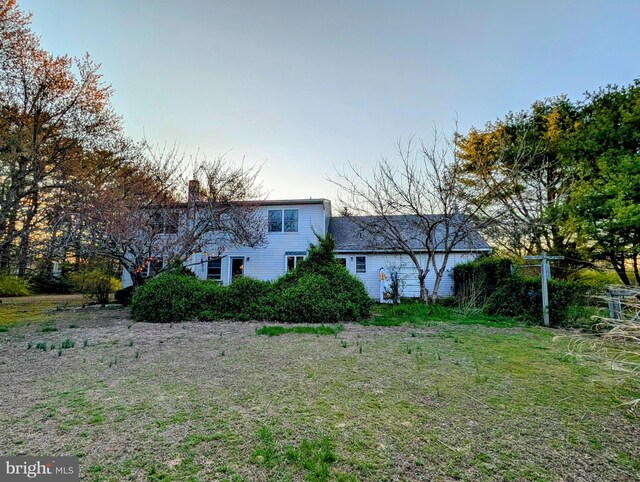 61 Perry Rd, Woodbine, NJ 08270 - view of front of property with a chimney and a front yard