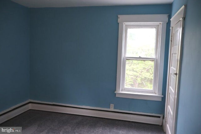 416 Lynwood Ave, Hamilton, NJ 08629 - spare room featuring carpet, a baseboard heating unit, and plenty of natural light