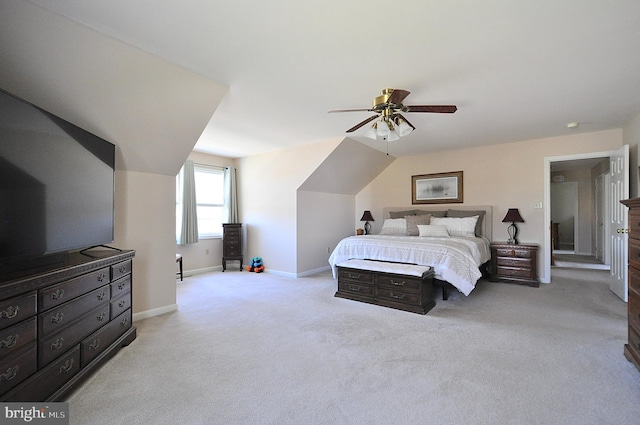 carpeted bedroom featuring a ceiling fan and baseboards