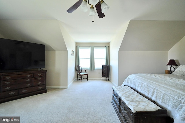carpeted bedroom featuring ceiling fan and baseboards