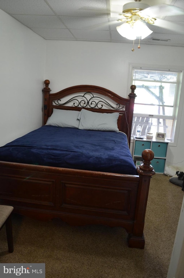 bedroom featuring carpet and a ceiling fan