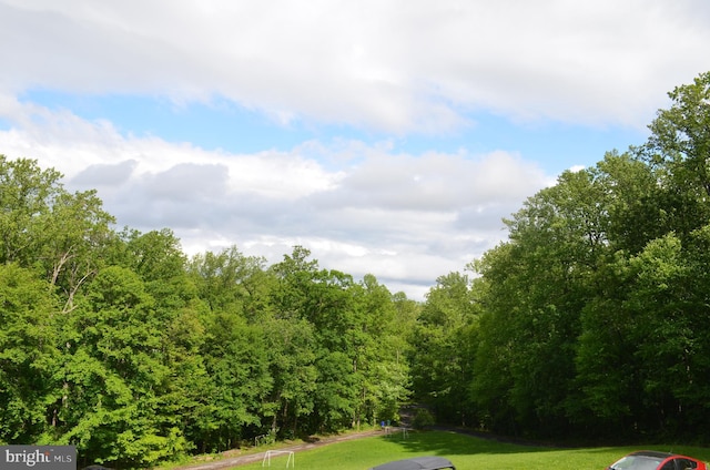 surrounding community featuring a lawn