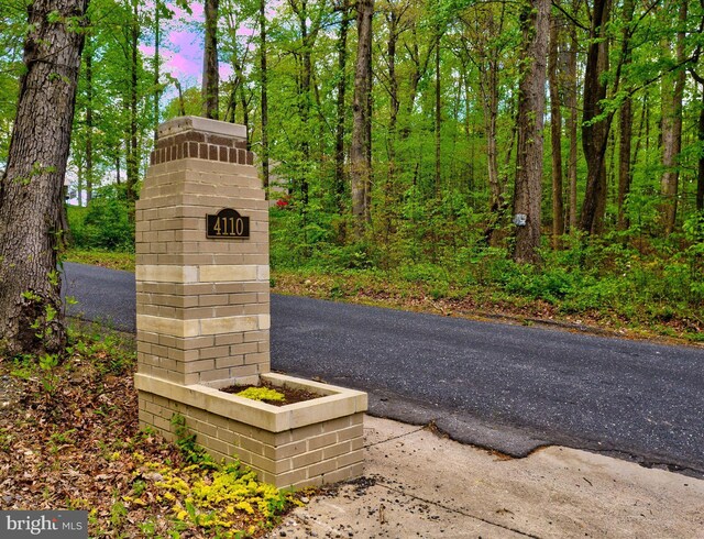 view of community sign