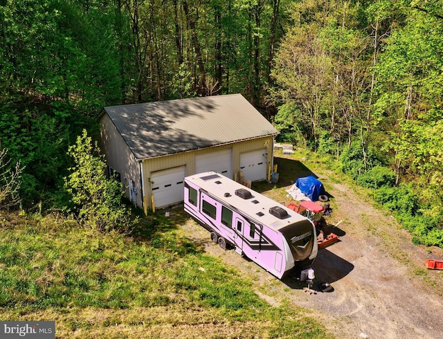 view from above of property featuring a forest