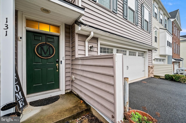 131 Time Cir, Bear, DE 19701 - entrance to property featuring an attached garage and driveway